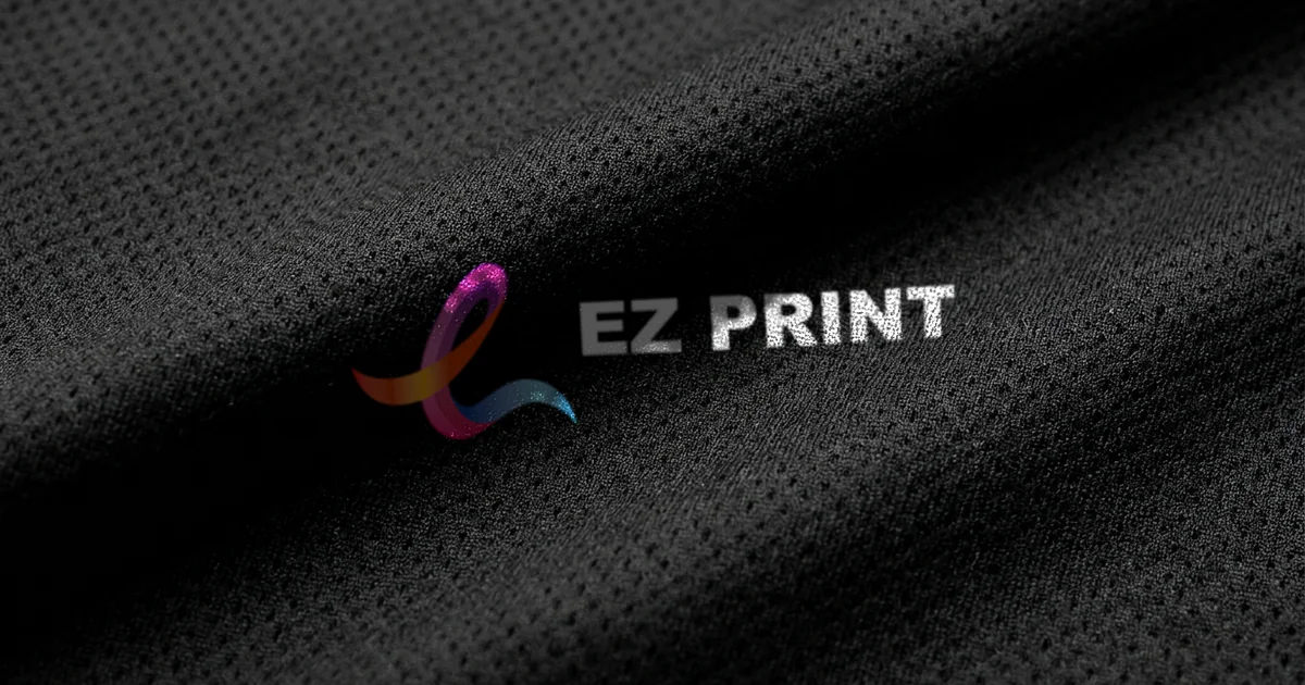 Close-up of black dri-fit mesh printed with the EZ Print logo.